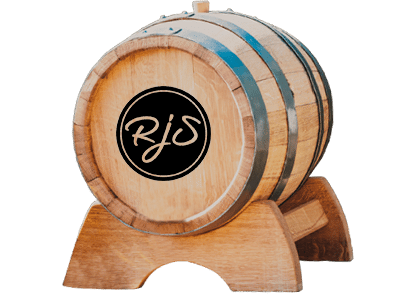 Small oak barrel on a wooden cradle with the RJS logo branded on the head